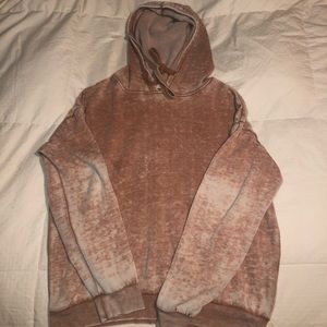 Washed out peach colored sweatshirt